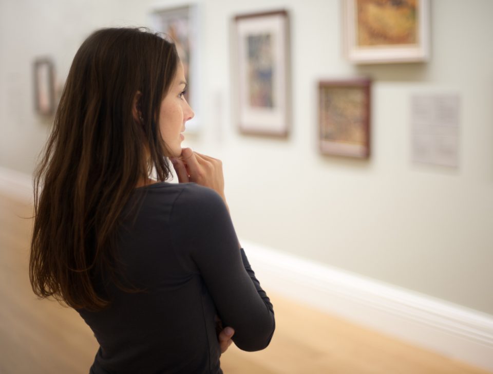 Woman viewing an exhibition at the Newark Museum