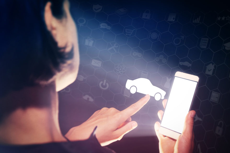 Woman shopping for a car on her smartphone