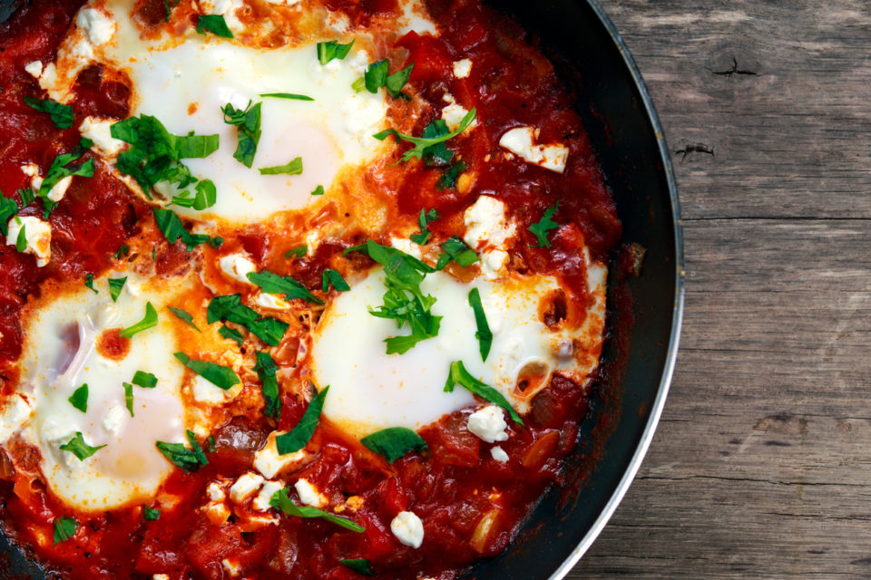 Fresh Eggs poached in Pan.