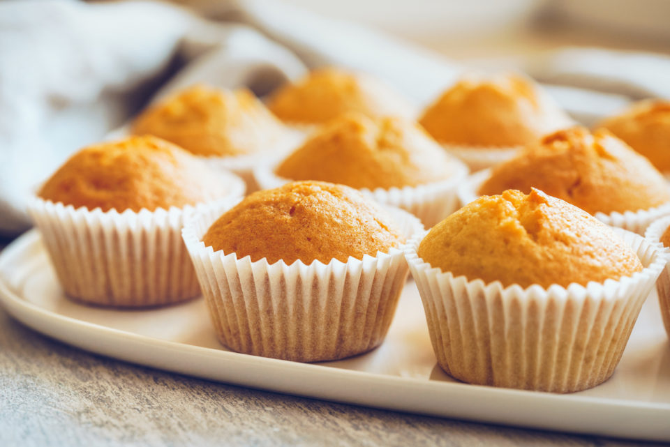 Muffins sitting on white plate